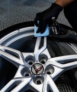 Corvette wheel being cleaned